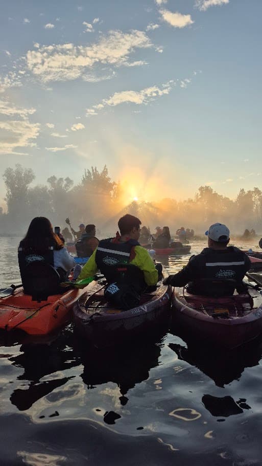 Sunrise kayak paddlers in Mexico City